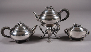 Georg Jensen silver partial tea service comprised of a teapot, tea kettle and covered sugar. Est. $8,000-$12,000. Image courtesy of Stefek's.